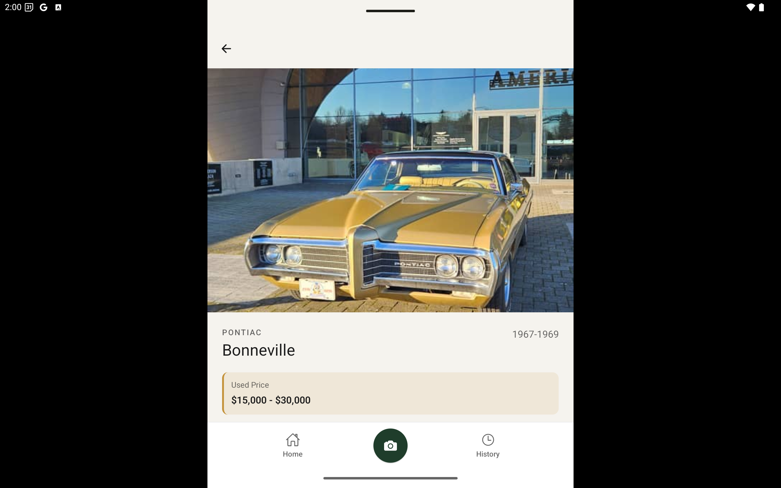 Car Reveal app showing a car identification result